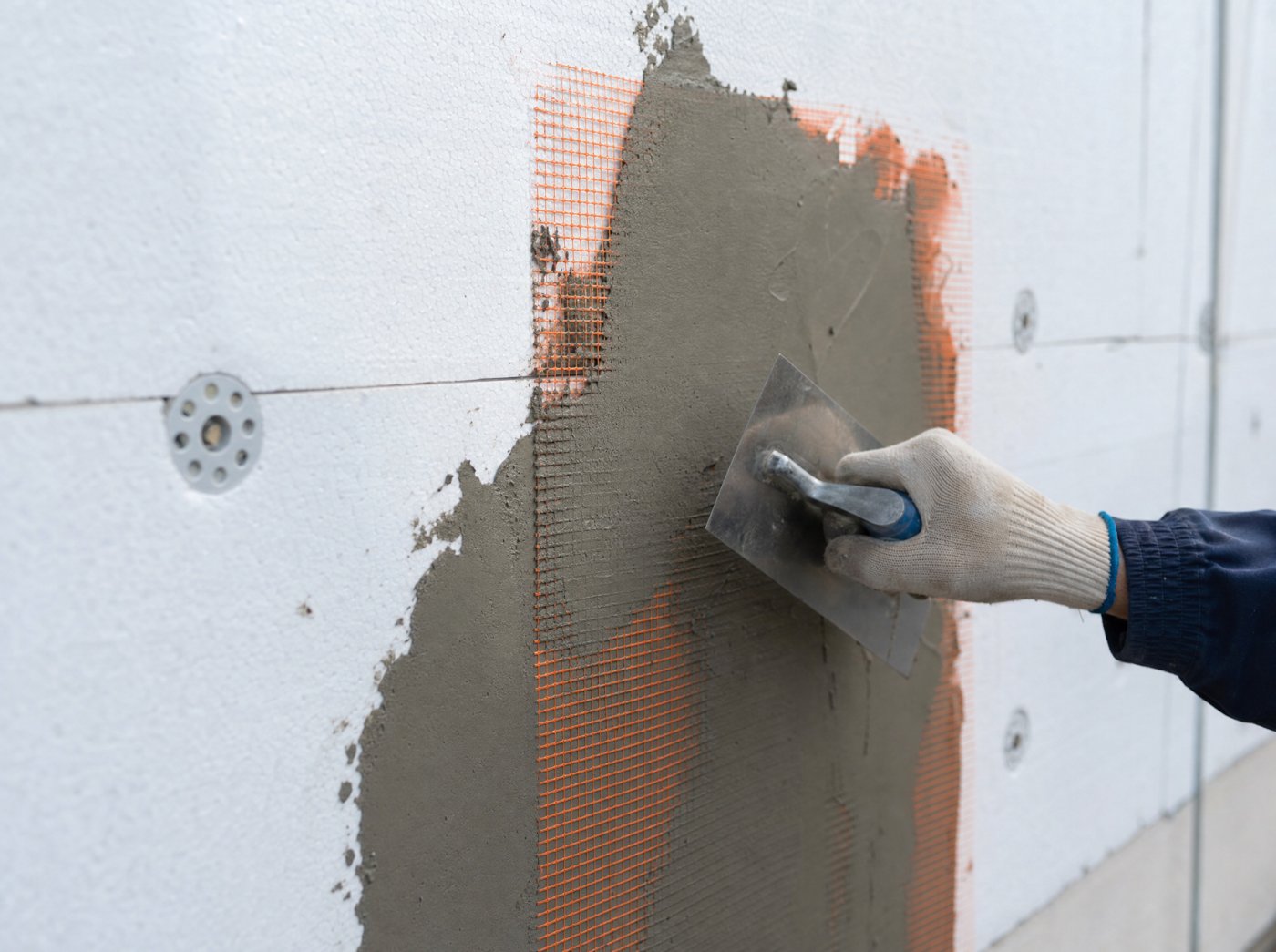Detalle de instalación del sistema SATE en fachada